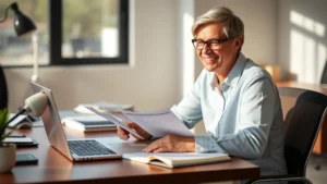 A person at a desk with a laptop and notebook, smiling while reviewing financial documents and creating a budget plan, natural lighting, realistic office setting